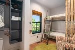 Bunk room with four twin beds and views to the deck